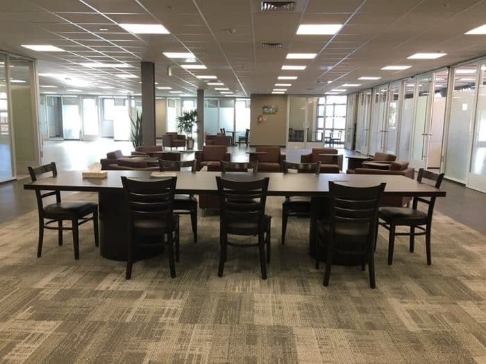 Office space with chairs and large tables