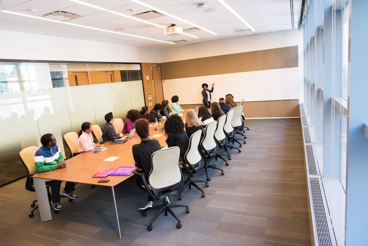 Group sitting in conference room